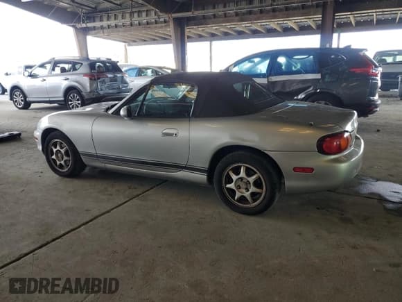 ✅ 1999 Mazda MX-5 Miata • VIN: JM1NB3530X0104289 • Лот: 82217305. Опубликован ранее на Copart с пробегом 150 760 миль. Бесплатный доступ к архиву аукционных продаж из США и подробный отчёт об истории автомобиля на DreamBid. Изображение 2.