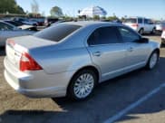 ✅ 2010 Ford Fusion Hybrid • VIN: 3FADP0L31AR258408 • Lot: 46703935. Listed on Copart with 151,402 mi. Free auction sales archive from the USA and detailed vehicle history report at DreamBid. Image 3.