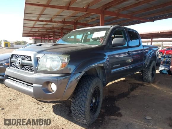 ✅ 2011 Toyota Tacoma • VIN: 3TMMU4FN0BM032561 • Lot: 41190472. Listed on IAAI with 188,862 mi. Free auction sales archive from the USA and detailed vehicle history report at DreamBid. Image 2.