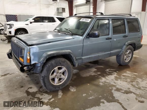 ✅ 1998 Jeep Cherokee Sport • VIN: 1J4FJ68S9WL122356 • Лот: 90879665. Опубликован ранее на Copart с пробегом 264 909 миль. Бесплатный доступ к архиву аукционных продаж из США и подробный отчёт об истории автомобиля на DreamBid. Изображение 1.