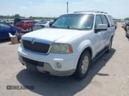 ✅ 2003 Lincoln Navigator Ultimate • VIN: 5LMFU27R93LJ25248 • Lot: 42280072. Listed on IAAI with 264,300 mi. Free auction sales archive from the USA and detailed vehicle history report at DreamBid. Image 2.