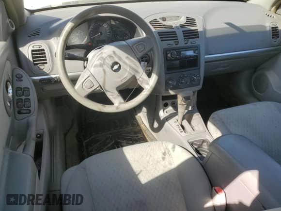 2005 Chevrolet Malibu z VIN 1G1ZS52F75F209328, wystawiony jako Copart lot #75717184 z przebiegiem 221 899 mil mil oraz Nie do naprawy • Non repairable. Historia ofert i sprzedaży dostępna na DreamBid. Obrazek 8.