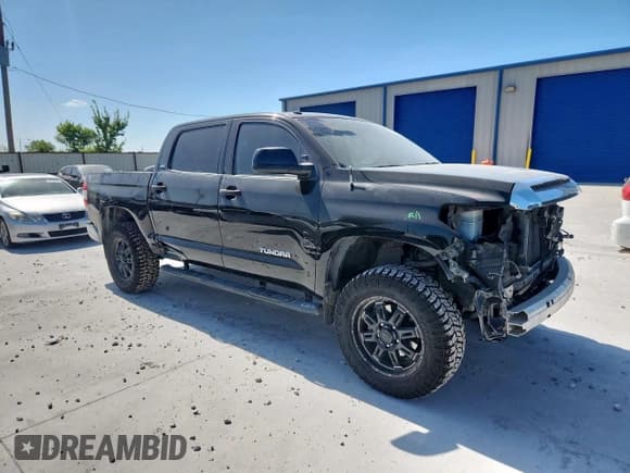 ✅ 2014 Toyota Tundra SR5 • VIN: 5TFDM5F12EX055728 • Lot: 66374775. Listed on Copart with 150,808 mi. Free auction sales archive from the USA and detailed vehicle history report at DreamBid. Image 4.