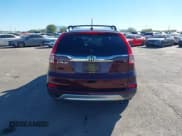 ✅ 2015 Honda CR-V EX-L • VIN: 2HKRM3H7XFH557041 • Lot: 43561107. Listed on IAAI with 146,461 mi. Free auction sales archive from the USA and detailed vehicle history report at DreamBid. Image 16.