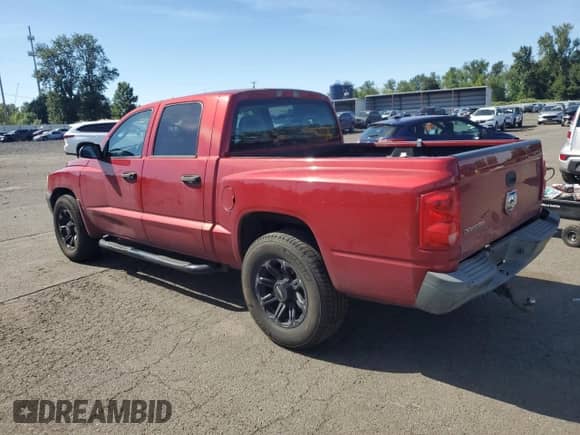 2006 Dodge Dakota ST с VIN 1D7HE28K56S522633, выставлен на аукционе Copart как лот 62197095 с пробегом 166 645 миль миль и Списание • Salvage title. История ставок и продаж доступна на DreamBid. Изображение 2.