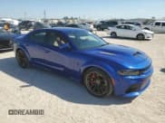 ✅ 2022 Dodge Charger SRT Hellcat Widebody • VIN: 2C3CDXL97NH159335 • Lot: 74745504. Listed on Copart with 13,630 mi. Free auction sales archive from the USA and detailed vehicle history report at DreamBid. Image 4.