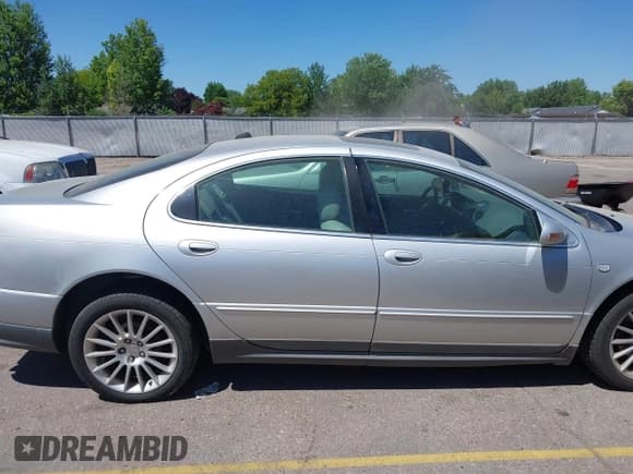 ✅ 2004 Chrysler 300M M • VIN: 2C3AE76K54H599183 • Lot: 42471293. Listed on IAAI with Not provided. Free auction sales archive from the USA and detailed vehicle history report at DreamBid. Image 6.