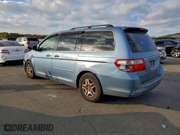 ✅ 2006 Honda Odyssey EX-L • VIN: 5FNRL38776B070297 • Лот: 95570655. Опубликован ранее на Copart с пробегом 124 763 миль. Бесплатный доступ к архиву аукционных продаж из США и подробный отчёт об истории автомобиля на DreamBid. Изображение 2.