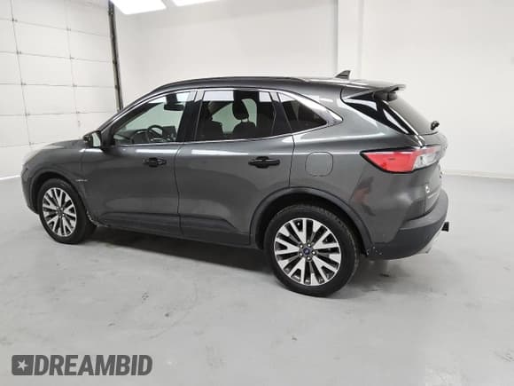 ✅ 2020 Ford Escape Titanium • VIN: 1FMCU9J90LUB20103 • Лот: 53809235. Опубликован ранее на Copart с пробегом 64 894 миль. Бесплатный доступ к архиву аукционных продаж из США и подробный отчёт об истории автомобиля на DreamBid. Изображение 2.