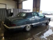 ✅ 1994 Buick Roadmaster • VIN: 1G4BN52P1RR421828 • Lot: 62710145. Listed on Copart with 130,889 mi. Free auction sales archive from the USA and detailed vehicle history report at DreamBid. Image 3.