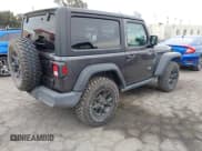 ✅ 2022 Jeep Wrangler Willys Sport • VIN: 1C4GJXAN7NW252931 • Lot: 40972143. Listed on IAAI with 12,823 mi. Free auction sales archive from the USA and detailed vehicle history report at DreamBid. Image 4.