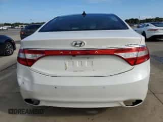2014 Hyundai Azera Limited z VIN KMHFH4JG2EA346683, wystawiony jako Copart lot #74352634 z przebiegiem Nie podano mil oraz Szkoda całkowita • Salvage title. Historia ofert i sprzedaży dostępna na DreamBid. Obrazek 6.