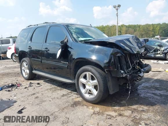 2012 Chevrolet Tahoe LT z VIN 1GNSCBE06CR215264, wystawiony jako IAAI lot #43274793 z przebiegiem 245 873 mil mil oraz . Historia ofert i sprzedaży dostępna na DreamBid. Obrazek 1.