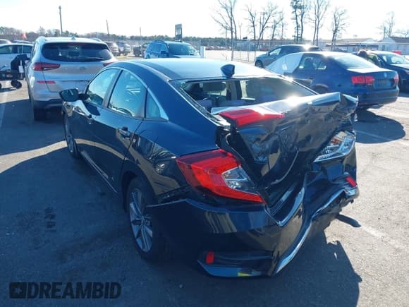 ✅ 2019 Honda Civic EX • VIN: 19XFC1F34KE204349 • Lot: 43780668. Listed on IAAI with 70,089 mi. Free auction sales archive from the USA and detailed vehicle history report at DreamBid. Image 3.