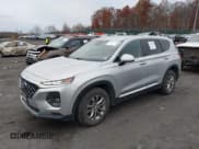 ✅ 2019 Hyundai Santa Fe SE • VIN: 5NMS2CAD7KH054274 • Lot: 43694931. Listed on IAAI with 96,329 mi. Free auction sales archive from the USA and detailed vehicle history report at DreamBid. Image 17.