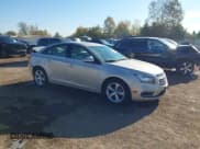 ✅ 2015 Chevrolet Cruze LT • VIN: 1G1PE5SBXF7102376 • Lot: 43539104. Listed on IAAI with 83,547 mi. Free auction sales archive from the USA and detailed vehicle history report at DreamBid. Image 1.