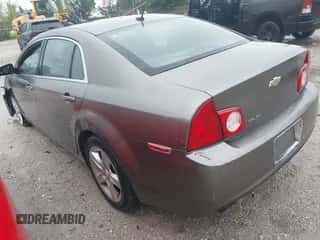 2010 Chevrolet Malibu 1LS with VIN 1G1ZB5EB6A4138069, listed as a IAAI auction lot 43388700 with 183,303 mi miles and . Bid and sale history available at DreamBid. Image 3.