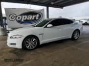 ✅ 2013 Jaguar XF RWD • VIN: SAJWA0E71D8S71834 • Lot: 82204345. Listed on Copart with 130,826 mi. Free auction sales archive from the USA and detailed vehicle history report at DreamBid. Image 1.