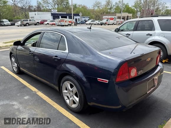 ✅ 2010 Chevrolet Malibu 1LS • VIN: 1G1ZB5EB6AF196056 • Lot: 53687215. Listed on Copart with 130,835 mi. Free auction sales archive from the USA and detailed vehicle history report at DreamBid. Image 3.
