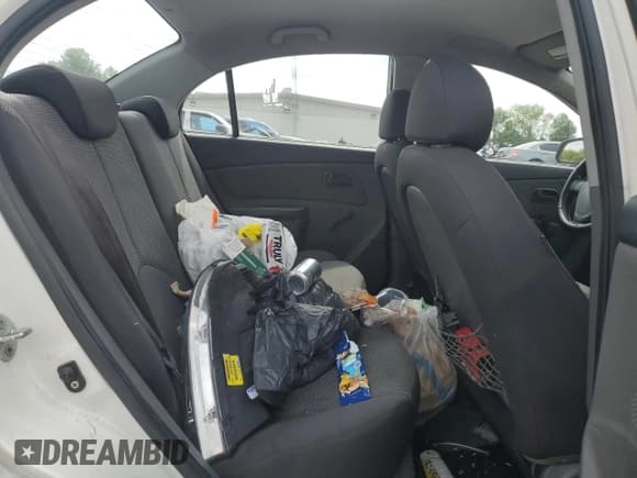 ✅ 2009 Kia Rio LX • VIN: KNADE223996526222 • Лот: 69976484. Опубликован ранее на Copart с пробегом 318 702 миль. Бесплатный доступ к архиву аукционных продаж из США и подробный отчёт об истории автомобиля на DreamBid. Изображение 10.