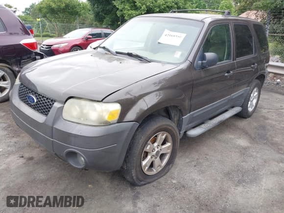 ✅ 2006 Ford Escape XLT • VIN: 1FMCU03116KB98490 • Lot: 42168558. Listed on IAAI with 255,382 mi. Free auction sales archive from the USA and detailed vehicle history report at DreamBid. Image 2.