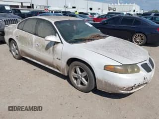 ✅ 2005 Pontiac Bonneville SLE • VIN: 1G2HY52K85U195941 • Lot: 43308327. Listed on IAAI with 256,766 mi. Free auction sales archive from the USA and detailed vehicle history report at DreamBid. Image 1.