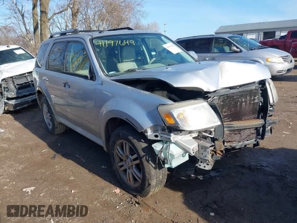 ✅ 2010 Mercury Mariner Premier • VIN: 4M2CN8HG8AKJ10048 • Lot: 41197649. Listed on IAAI with 176,248 mi. Free auction sales archive from the USA and detailed vehicle history report at DreamBid. Image 1.