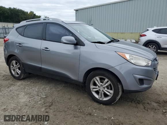 2011 Hyundai Tucson GLS z VIN KM8JU3AC1BU275337, wystawiony jako Copart lot #72953794 z przebiegiem 255 917 mil mil oraz Szkoda całkowita • Salvage title. Historia ofert i sprzedaży dostępna na DreamBid. Obrazek 4.
