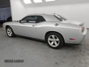 ✅ 2012 Dodge Challenger SXT • VIN: 2C3CDYAG9CH257836 • Lot: 41896165. Wystawiony na Copart z przebiegiem 124 813 mil. Bezpłatny archiwum sprzedaży aukcyjnych z USA i szczegółowy raport historii pojazdu na DreamBid. Zdjęcie 2.