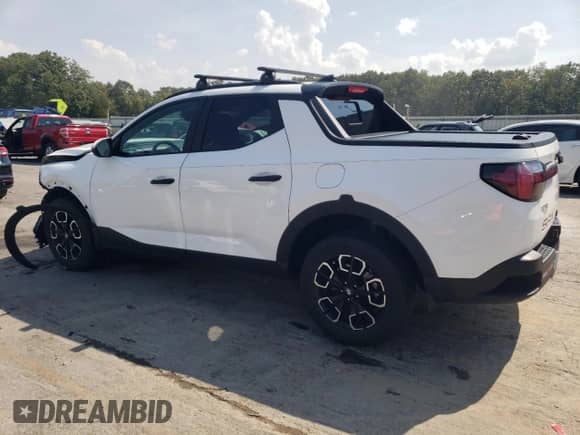 2023 Hyundai Santa Cruz SEL with VIN 5NTJC4AE0PH076202, listed as a Copart auction lot 81050525 with 34,465 mi miles and Salvage title. Bid and sale history available at DreamBid. Image 2.