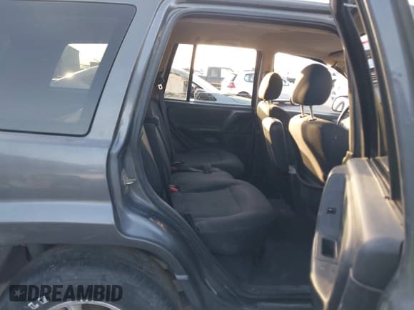 ✅ 2003 Jeep Grand Cherokee Laredo • VIN: 1J4GW48S03C595326 • Lot: 43837212. Listed on IAAI with Not provided. Free auction sales archive from the USA and detailed vehicle history report at DreamBid. Image 8.