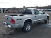 ✅ 2004 Dodge Dakota SLT • VIN: 1D7HG48N04S603763 • Lot: 41607984. Wystawiony na IAAI z przebiegiem 157 360 mil. Bezpłatny archiwum sprzedaży aukcyjnych z USA i szczegółowy raport historii pojazdu na DreamBid. Zdjęcie 4.