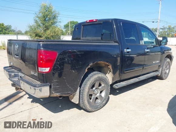 ✅ 2005 Nissan Titan LE • VIN: 1N6AA07B35N504302 • Lot: 43149610. Listed on IAAI with 171,549 mi. Free auction sales archive from the USA and detailed vehicle history report at DreamBid. Image 4.