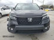 ✅ 2021 Honda Passport EX-L • VIN: 5FNYF8H58MB040933 • Lot: 51067505. Listed on Copart with 64,963 mi. Free auction sales archive from the USA and detailed vehicle history report at DreamBid. Image 5.