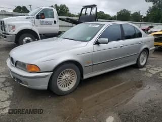 ✅ 1998 BMW 5 Series 540i • VIN: WBADE6323WBW58831 • Lot: 59864925. Listed on Copart with 216,554 mi. Free auction sales archive from the USA and detailed vehicle history report at DreamBid. Image 1.