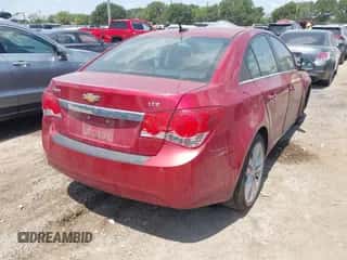 2013 Chevrolet Cruze LTZ z VIN 1G1PG5SB5D7191250, wystawiony jako IAAI lot #43035511 z przebiegiem 76 610 mil mil oraz . Historia ofert i sprzedaży dostępna na DreamBid. Obrazek 4.