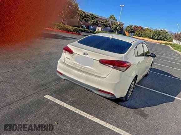 ✅ 2018 Kia Forte LX • VIN: 3KPFK4A76JE215219 • Lot: 94997815. Listed on Copart with 97,168 mi. Free auction sales archive from the USA and detailed vehicle history report at DreamBid. Image 4.