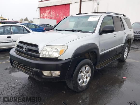 ✅ 2003 Toyota 4Runner SR5 • VIN: JTEBT14R430004776 • Lot: 43696472. Listed on IAAI with 256,594 mi. Free auction sales archive from the USA and detailed vehicle history report at DreamBid. Image 2.