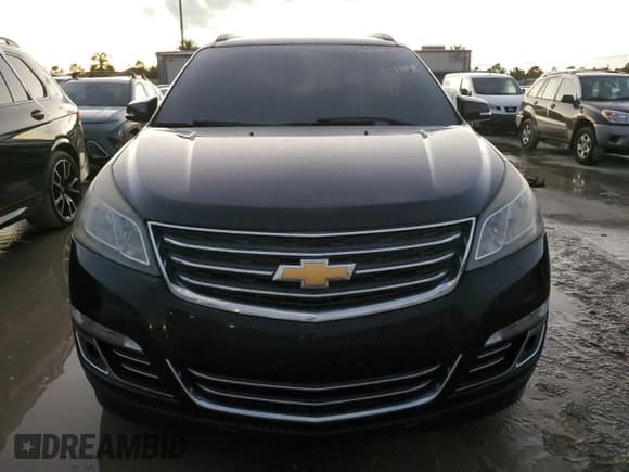 ✅ 2016 Chevrolet Traverse LTZ • VIN: 1GNKRJKD0GJ109851 • Lot: 73744974. Wystawiony na Copart z przebiegiem Nie podano. Bezpłatny archiwum sprzedaży aukcyjnych z USA i szczegółowy raport historii pojazdu na DreamBid. Zdjęcie 5.