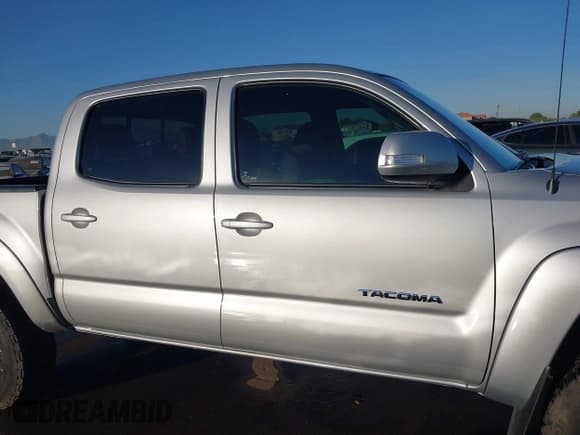 ✅ 2013 Toyota Tacoma PreRunner • VIN: 3TMJU4GN9DM145025 • Лот: 43617866. Опубликован ранее на IAAI с пробегом 99 587 миль. Бесплатный доступ к архиву аукционных продаж из США и подробный отчёт об истории автомобиля на DreamBid. Изображение 13.