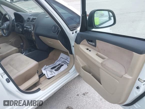 ✅ 2013 Suzuki SX4 LE • VIN: JS2YC5A31D6101654 • Lot: 42970256. Wystawiony na IAAI z przebiegiem 142 596 mil. Bezpłatny archiwum sprzedaży aukcyjnych z USA i szczegółowy raport historii pojazdu na DreamBid. Zdjęcie 5.