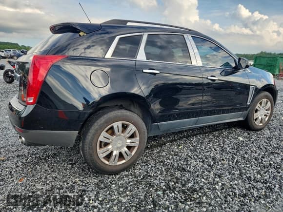 ✅ 2015 Cadillac SRX • VIN: 3GYFNAE30FS618905 • Lot: 67161835. Wystawiony na Copart z przebiegiem 118 335 mil. Bezpłatny archiwum sprzedaży aukcyjnych z USA i szczegółowy raport historii pojazdu na DreamBid. Zdjęcie 3.