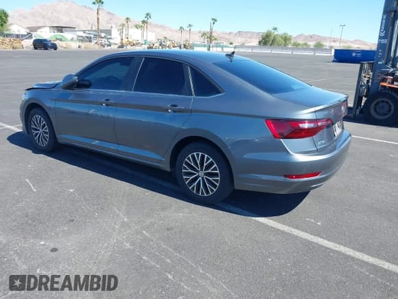 ✅ 2021 Volkswagen Jetta S • VIN: 3VWC57BU4MM005208 • Лот: 43301372. Опубликован ранее на IAAI с пробегом 130 644 миль. Бесплатный доступ к архиву аукционных продаж из США и подробный отчёт об истории автомобиля на DreamBid. Изображение 3.