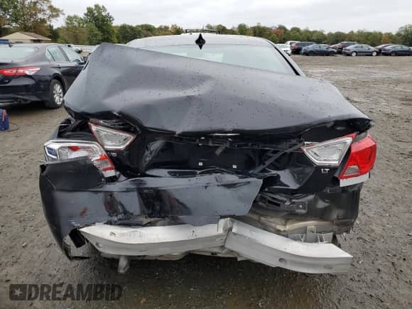 2017 Chevrolet Impala LT z VIN 2G1105S38H9185689, wystawiony jako Copart lot #86317055 z przebiegiem 128 364 mil mil oraz Szkoda całkowita • Salvage title. Historia ofert i sprzedaży dostępna na DreamBid. Obrazek 6.