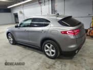 ✅ 2018 Alfa Romeo Stelvio • VIN: ZASFAKAN7J7C01195 • Lot: 82287485. Listed on Copart with 62,431 mi. Free auction sales archive from the USA and detailed vehicle history report at DreamBid. Image 2.