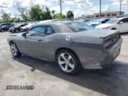 ✅ 2017 Dodge Challenger R/T Plus • VIN: 2C3CDZBT7HH561210 • Лот: 69439015. Опубликован ранее на Copart с пробегом 216 326 миль. Бесплатный доступ к архиву аукционных продаж из США и подробный отчёт об истории автомобиля на DreamBid. Изображение 2.