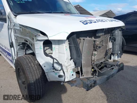 ✅ 2016 Nissan NV S • VIN: 1N6BF0KM4GN808661 • Lot: 43751723. Listed on IAAI with 122,067 mi. Free auction sales archive from the USA and detailed vehicle history report at DreamBid. Image 6.