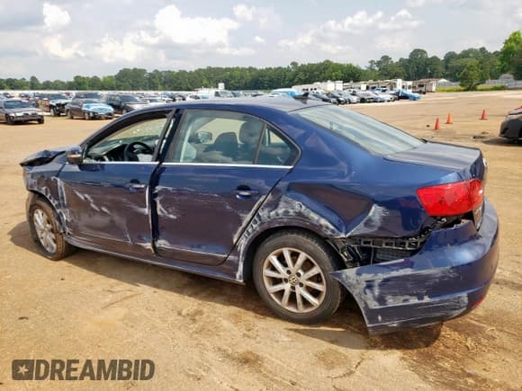 ✅ 2013 Volkswagen Jetta SE • VIN: 3VWDP7AJ8DM209712 • Lot: 59168045. Listed on Copart with 94,813 mi. Free auction sales archive from the USA and detailed vehicle history report at DreamBid. Image 2.