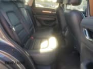 ✅ 2022 Mazda CX-5 S Premium • VIN: JM3KFBDMXN1543266 • Лот: 86109205. Опубликован ранее на Copart с пробегом 64 226 миль. Бесплатный доступ к архиву аукционных продаж из США и подробный отчёт об истории автомобиля на DreamBid. Изображение 11.