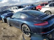 ✅ 2015 Porsche 911 Carrera • VIN: WP0AA2A94FS106247 • Lot: 41905194. Listed on Copart with 26,028 mi. Free auction sales archive from the USA and detailed vehicle history report at DreamBid. Image 2.